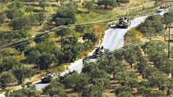 Esad'ın tankları Türkiye sınırında