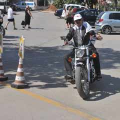 Tüzmen'den motosikletli 'evet' çalışması