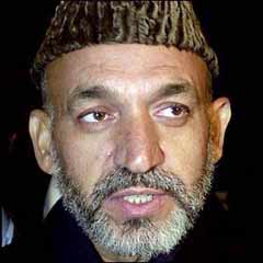 Karzai apar topar ayrıldı