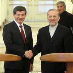 Davutoğlu, İran'da Mutteki ile görüştü