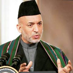 Karzai: Kadın yasası gözden geçirilecek