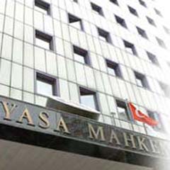 Raportör başörtüsü davasının reddini istedi