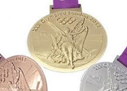 412 gramlık madalyanın 5,5 gramı altın