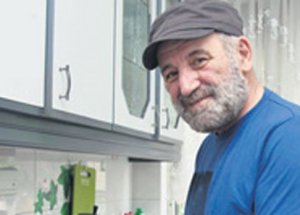 Savaş Ay Kimdir?