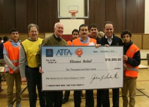 Amerikalılardan Suriyeli mültecilere battaniye ve para yardımı