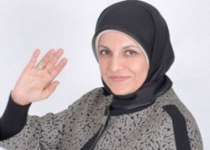 İşte Türkiye'nin Başörtülü İlk Başkanı