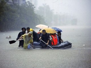 Çin'de Şiddetli Yağışlarda 18 Kişi Öldü