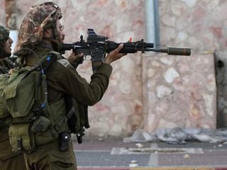 İsrail Askerleri Filistinli Çocuğu Öldürdü!