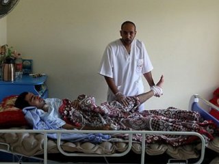 İsrail'in Yıktığı Hastaneden Yardım Çığlığı