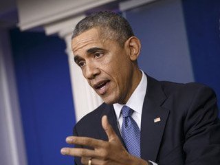 Obama'dan Japon Gazetecinin Ailesine Baş Sağlığı