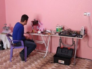 Hurdalardan Kur'an Okuyan Robot Yaptı