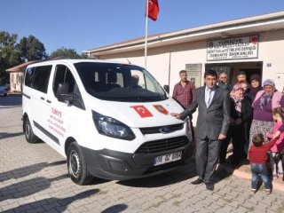 Bahçeli'den şehit ailelerine minibüs