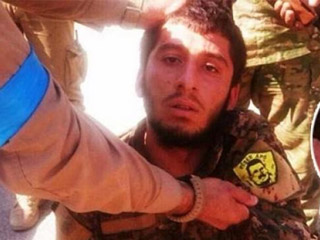 PKK'nın Suriye uzantısı PYD'lilerin üzerinden 'Apo' arması çıktı