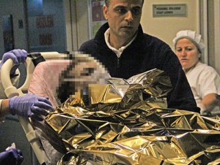 Eşini benzin döküp yaktı