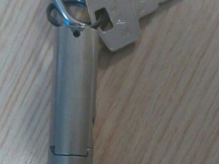 Adliyeye anahtarlık şeklinde silahla girmek istedi