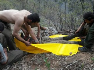 Teröristler cesetleri topladı