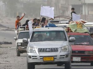 Musul'da çatışma ortasında kalan siviller güvenli bölgelere kaçıyor